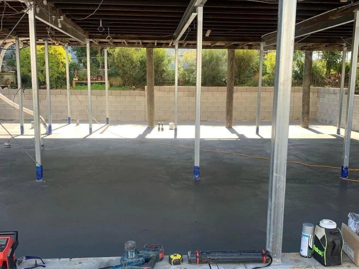 Laser levelling equipment in use under a Perth home